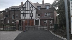 metal gate ,electric gate on tudor styled house